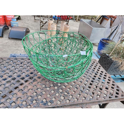 17 - Green metal hanging baskets
