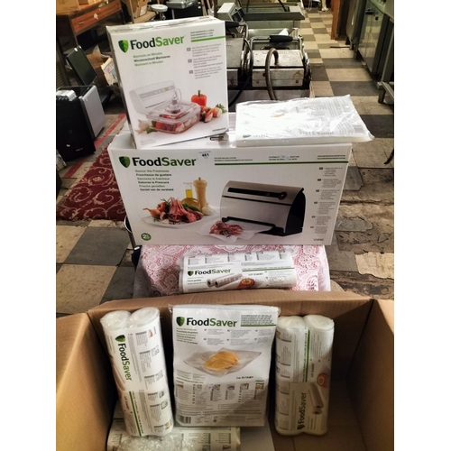 461 - Food Saver Vacuum sealing system, Food Saver Marinator and various bags and rolls. All brand new