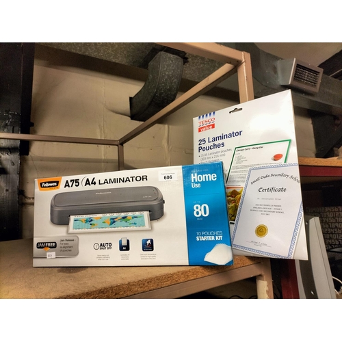 606 - A4 laminator in box and 25 laminator pouches