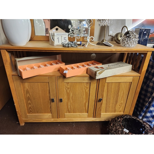 2051 - Quality wooden sideboard with shelf and three cupboards