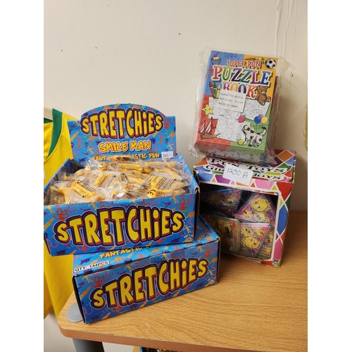 1700A - Two boxes of Stretchies Smile Men, collection of puzzle books and Fun toys puzzle games