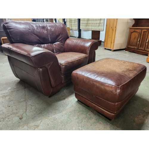 2083 - Very Large leather armchair great condition with matching foot stool lovely patina