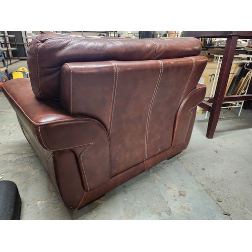 2083 - Very Large leather armchair great condition with matching foot stool lovely patina