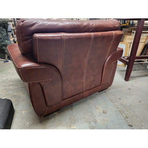 2083 - Very Large leather armchair great condition with matching foot stool lovely patina