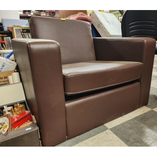 765 - Modern brown faux leather armchair