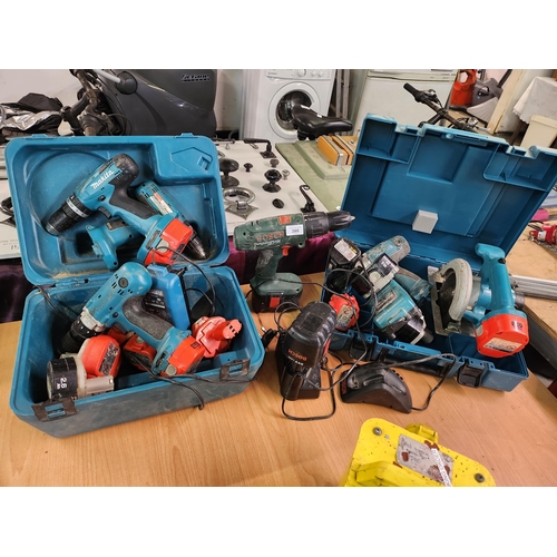 388 - Large selection of makita and Bosch drills and circular saw