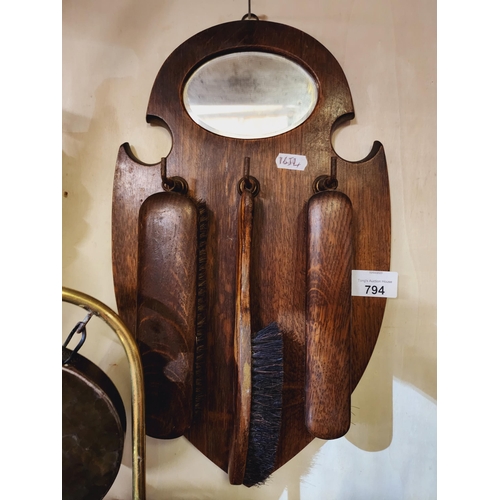 794 - Early 20th century wall mountable Hall clothes brush and small mirror on shield back plaque