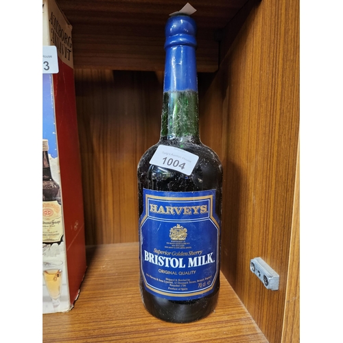 1004 - Vintage bottle and contents Harveys bristol Milk