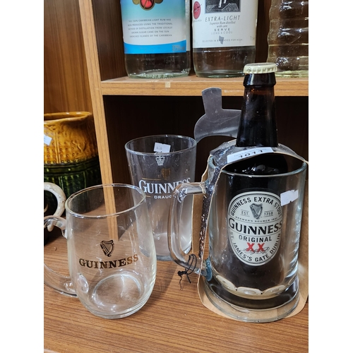 1011 - Collection of 3 Guinness glasses and one unopened bottle