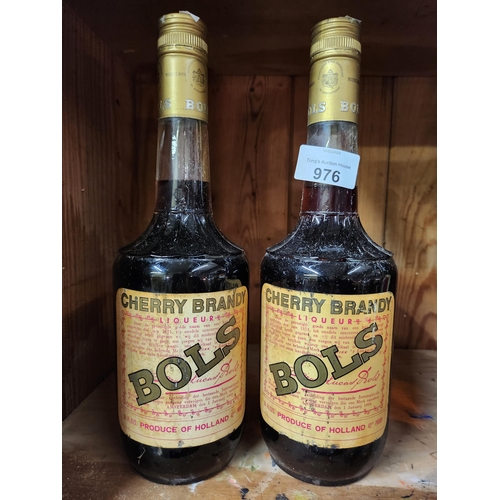 976 - 2x Vintage bottles with contents unopened cherry brandy Bols