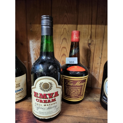 986 - Vintage bottles with contents unopened Crofts Porto Fino and vintage bottle of Tia Maria
