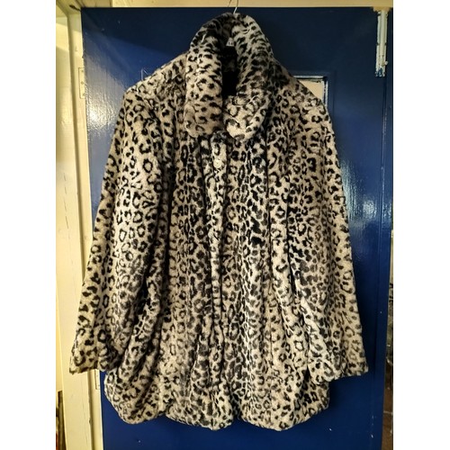 1494 - Beautifully silky faux fur coat by Wardrobe in a size 30