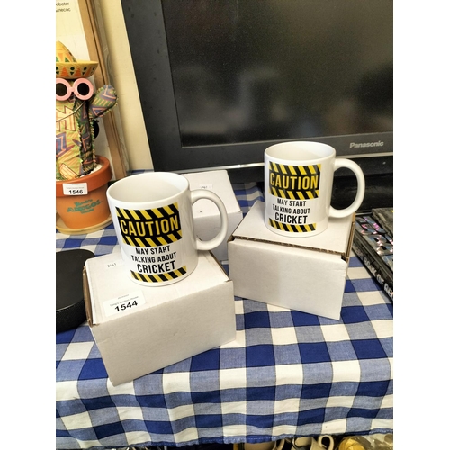 1544 - Three ‘caution may start talking about cricket’ mugs