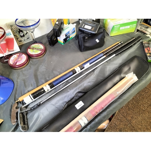 1567 - Two golf clubs and a BCE custom 9 cue