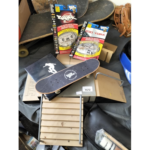 1572 - Collection of tech deck toy skateboard items and under exposed 2 skateboarding DVD