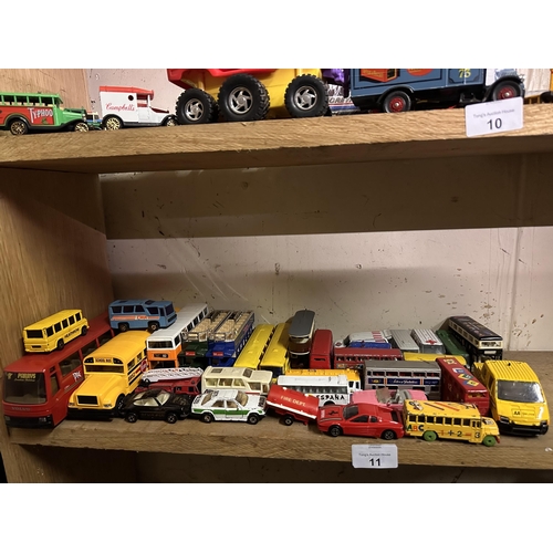 11 - Large collection of model and die cast vehicles including Silver Jubilee bus, AA, School Bus, TWA an... 