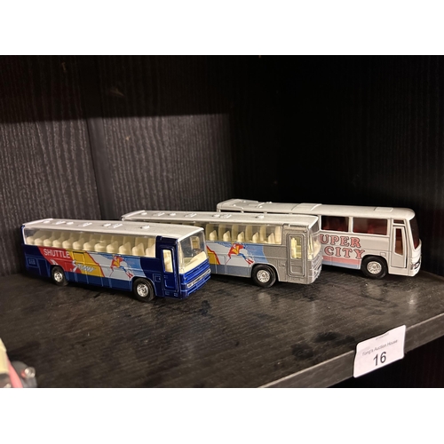 16 - Three die cast buses