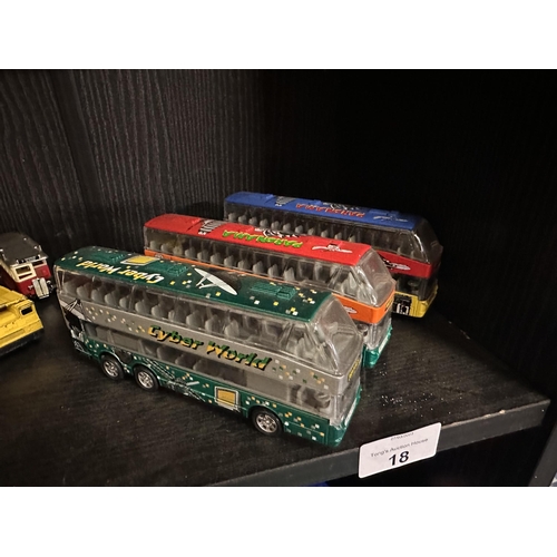 18 - Three die cast model buses including Cyber World and Paronama