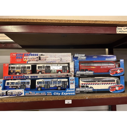 29 - Two boxed Dickie City Buses and two boxed Peterkin Motor Zone Super Coaches