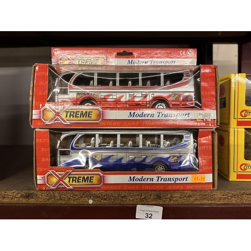 32 - Two boxed Xtreme Modern Transport buses in red and blue