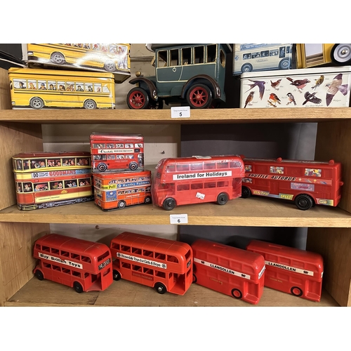 6 - Collection of Buses including Goodmans, Huntley and Churchill's tins as well as 'Ireland for Holiday... 