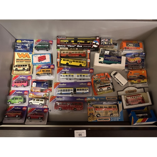 66 - Collection of various model vehicles including Wallace Arnold Holiday Coach, Siku Alligator Farm bus... 