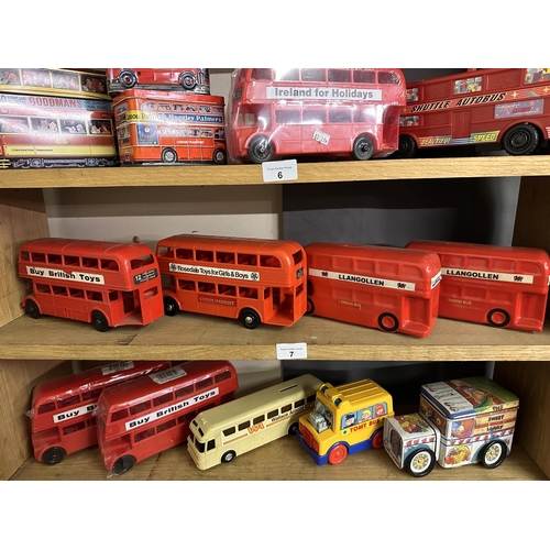 7 - Four models of London buses including 'Llangollen', 'Buy British Toys' and 'London Transport Rosedal... 