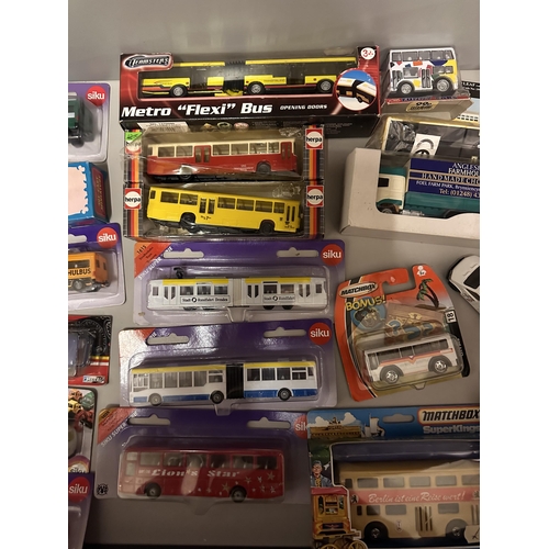 66 - Collection of various model vehicles including Wallace Arnold Holiday Coach, Siku Alligator Farm bus... 