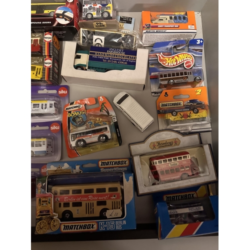 66 - Collection of various model vehicles including Wallace Arnold Holiday Coach, Siku Alligator Farm bus... 