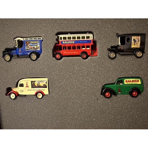 597 - The Raleigh limited edition set including five die cast model vehicles of cars, bus and vans with Ra... 