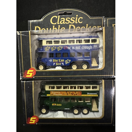 651 - Collection of four Sunnyside Collectibles Classic Double Decker die cast free wheeling model buses i... 