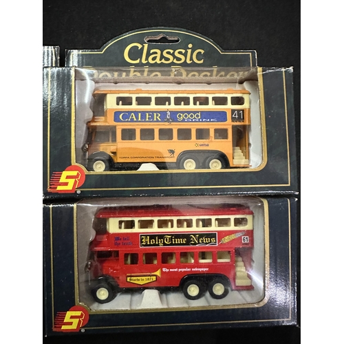 651 - Collection of four Sunnyside Collectibles Classic Double Decker die cast free wheeling model buses i... 