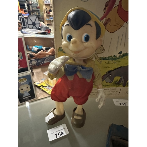 754 - Vintage Pinocchio figure, repair needed to leg