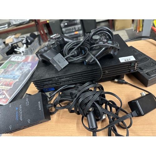 827 - PlayStation 2 console with controllers and leads