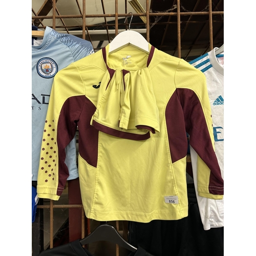 856 - Childrens football kit in yellow and maroon