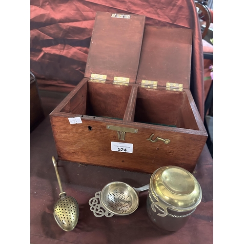 524 - Wooden tea caddy with two compartments and tea making set