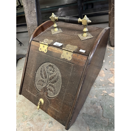 530 - Wooden coal box with carved decoration and brass fittings