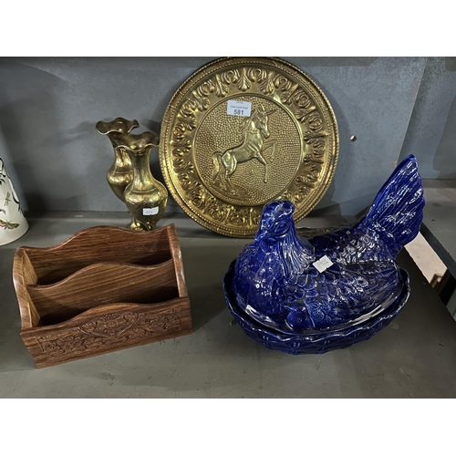 581 - Collection of items including brass plate and vases, wooden letter rack and blue chicken lidded pot