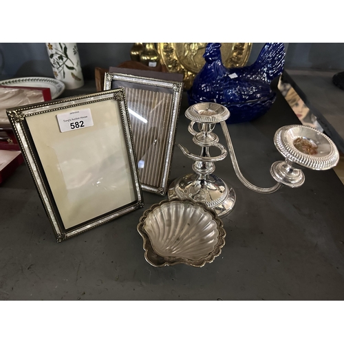 582 - Pair of decorative photo frames, two armed candelabra and shell dish