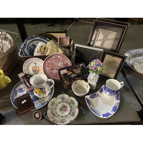 650 - Large collection of items including picture frames, plates and mugs