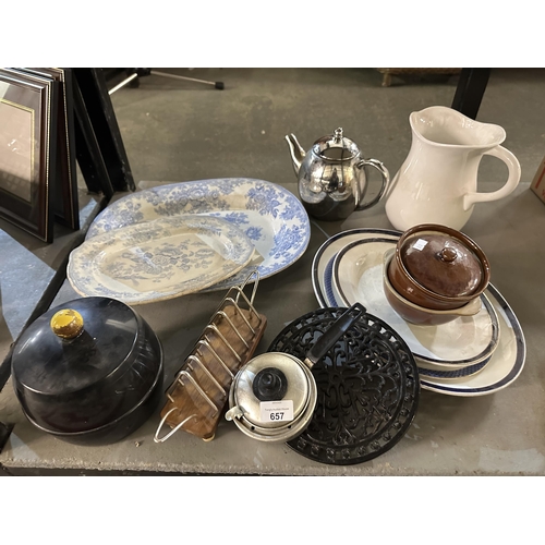 657 - Collection of items including charger plates, jug, tea pot and saucepan
