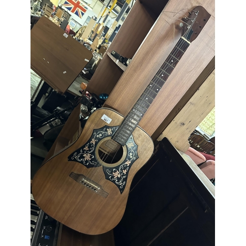 661 - Acoustic guitar with decorative design in need of some attention