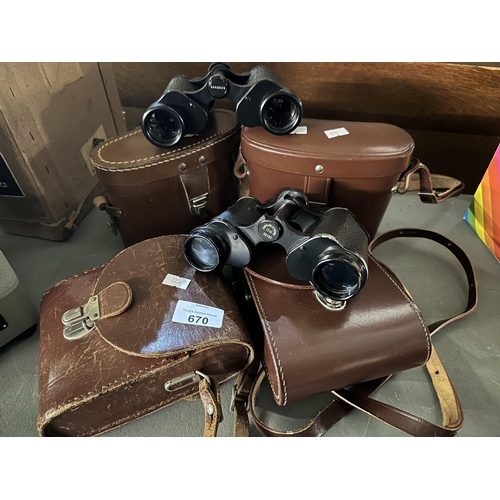 670 - Two pairs of binoculars including Carl Zeiss Jenoptem and four cases