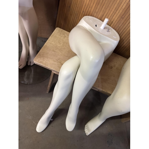 718 - Two sets of seated mannequin legs, one male and one female