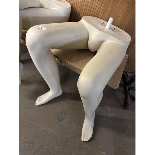 718 - Two sets of seated mannequin legs, one male and one female