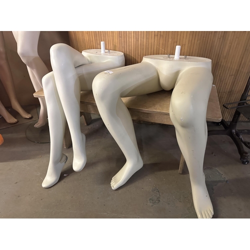 718 - Two sets of seated mannequin legs, one male and one female