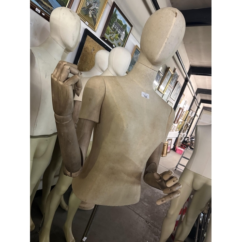 720 - Torso mannequin with removable head and removable adjustable wooden arms on metal stand