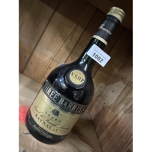 1002 - Unopened bottle of Three Barrels brandy