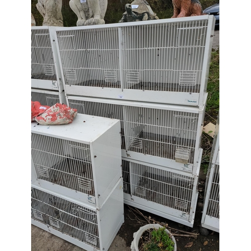 157 - 3 large bird cages, each contains 2 compartments, perfect for birds or small animals.
88cm width.