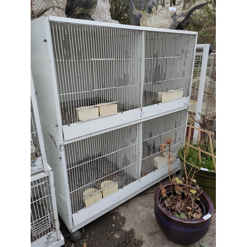 162 - 2 large bird cages containing 2 compartments, perfect for birds or small animals.
88cm width.